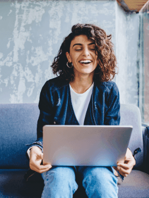 young woman sitting with laptop