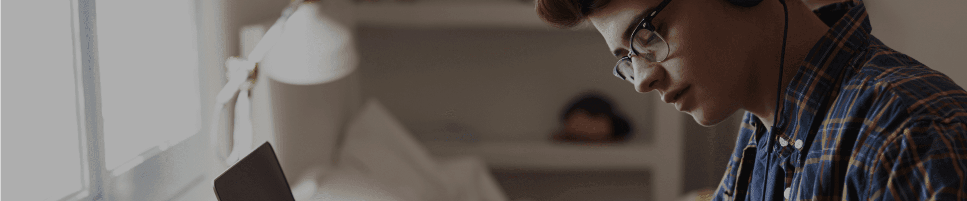 Graduates story image Young man with glasses with a laptop