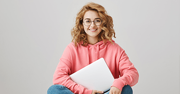 Smiling woman image Smiling woman with glasses and laptop